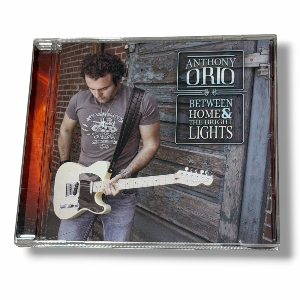 Anthony Orio Between Home & The Bright Lights CD SIGNED 2012